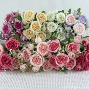 New artificial flower wedding bouquet, small bouquet of Persian peonies and Phyllanthus roses