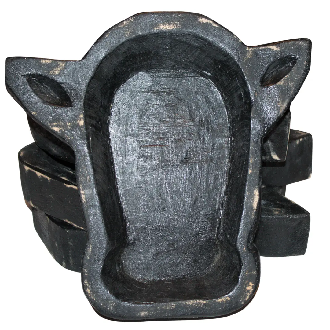 Antique black cow head dough bowl