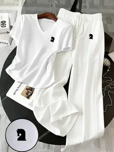 Fashionable Two-Piece Women's V-Neck Set: Soft stretch T-shirt paired with high-waisted wide-leg pants. Comfortable and breathable, perfect for casual days, loungewear, or street style outfits. A must-have TikTok trending style! Streetwear