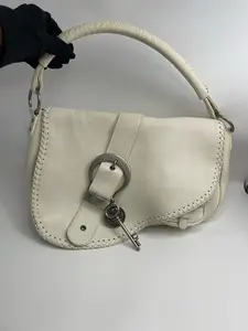 Pre-owned Dior Takashi saddle bag, designed by John Galliano Pebbled leather 98% new size:34x18cm