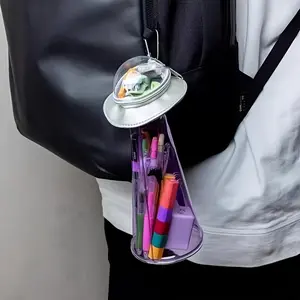 2025 new creative UFO modeling transparent green alien doll decorative pencil case, four seasons desktop storage box, interesting UFO space ship stationery bag.