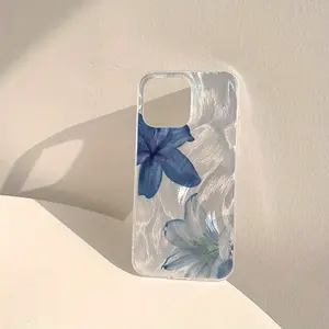 A  Case Featuring Two Blue And White Lily Designs Made of Feather-Like Material, Compatible with for iphone 17Pro Max/16/15/14/13/12/11. It Makes a Great Gift for a Girlfriend, Boyfriend, Friend, Or Even for