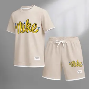 Men's Classic Logo print drawstring shorts set for spring/summer, a casual summer outfit including a short-sleeved shirt and shorts, suitable for everyday wear and sports. A two-piece set for a relaxed and energetic lifestyle.