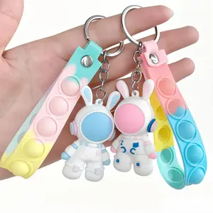 2 Pcs Astronaut Pop Keychain – Cute Bubble Popper Fidget Toy, Soft Silicone Spaceman Pendant for Keys & Bags, Stress Relief Gift for Adults Kids