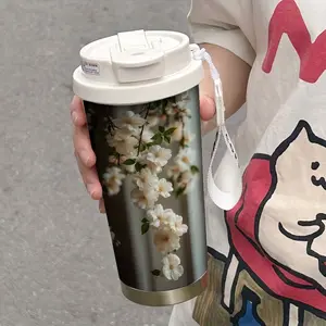 17 oz 316 Stainless Steel Insulated Mug with Weeping Cherry Blossom Design - Portable Coffee Mug. A modern Chinese-style mug with a cool, insulated feel, perfect for car use. A water mug, tumbler, or office cup with three different drinking options.
