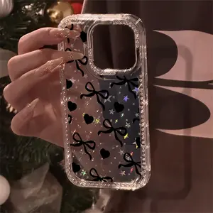 Black heart and bowknot pattern, transparent glitter diamond frame star case, shockproof, sparkling protective case, suitable for iPhone 17, 16, 15, 14, 13, 12 and other series models, can be given as a gift to friends or family.
