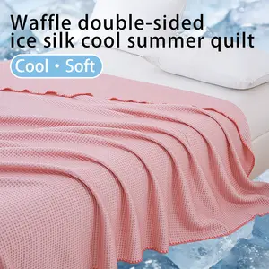 One double-sided cooling blanket, a lightweight summer quilt made of cool ice silk, featuring a waffle pattern, multi-functional design, lightweight and breathable.