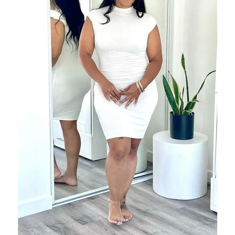 lois mini dress in ivory MAJORELLE Model is 59 and wearing size XS MAJORELLE - Lois Mini Dress