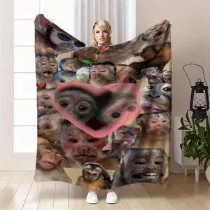 Monkey Heart Expression Flannel Blanket - Soft plush fabric attached to the face of the expressive monkey. Heart-shaped design - Lightweight and warm blanket suitable for sofas, beds, offices.