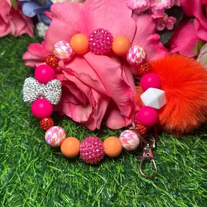 Posh girl wristlet keychain color scheme light orange, hot pink, , white and bling beads made with wire