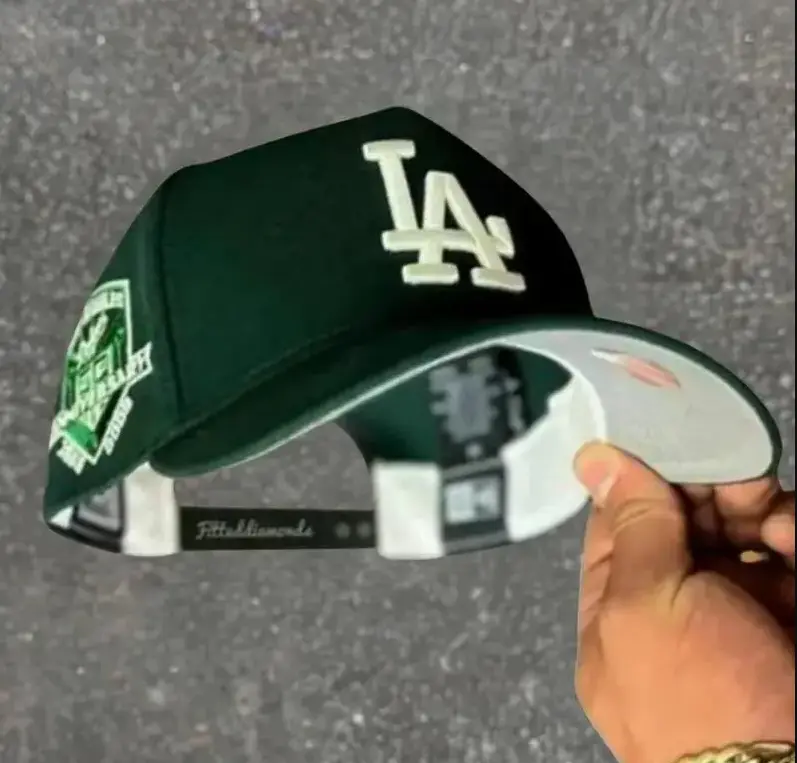 Los Angeles Dodgers New Era 9FORTY Snapback Baseball Cap – Dark Green Flat Brim Hat with White LA Logo & Anniversary Side Patch, MLB Streetwear Headwear
