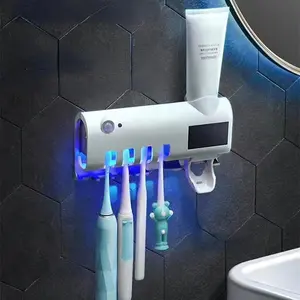 Holder Automatic Toothbrush Toothpaste Dispenser Set Dustproof Sticky Suction Wall Mounted Toothpaste Squeezer for Bathroom UV Sterilizer Smart Toothbrush Holder family decor