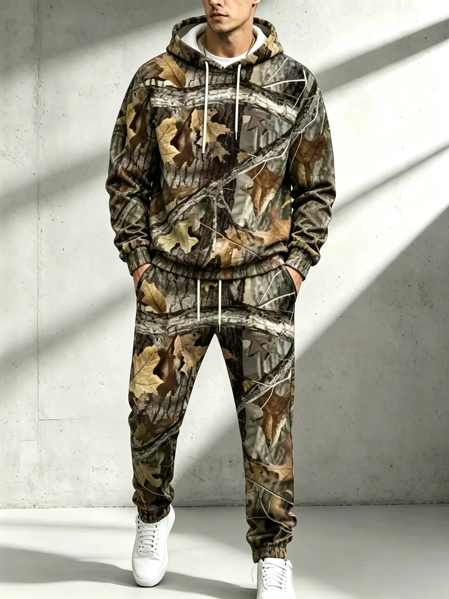 Men’s two-piece set: hooded sweatshirt and athletic pants, 3D realistic tree camouflage with numeric print; casual outdoor sportswear for everyday wear.