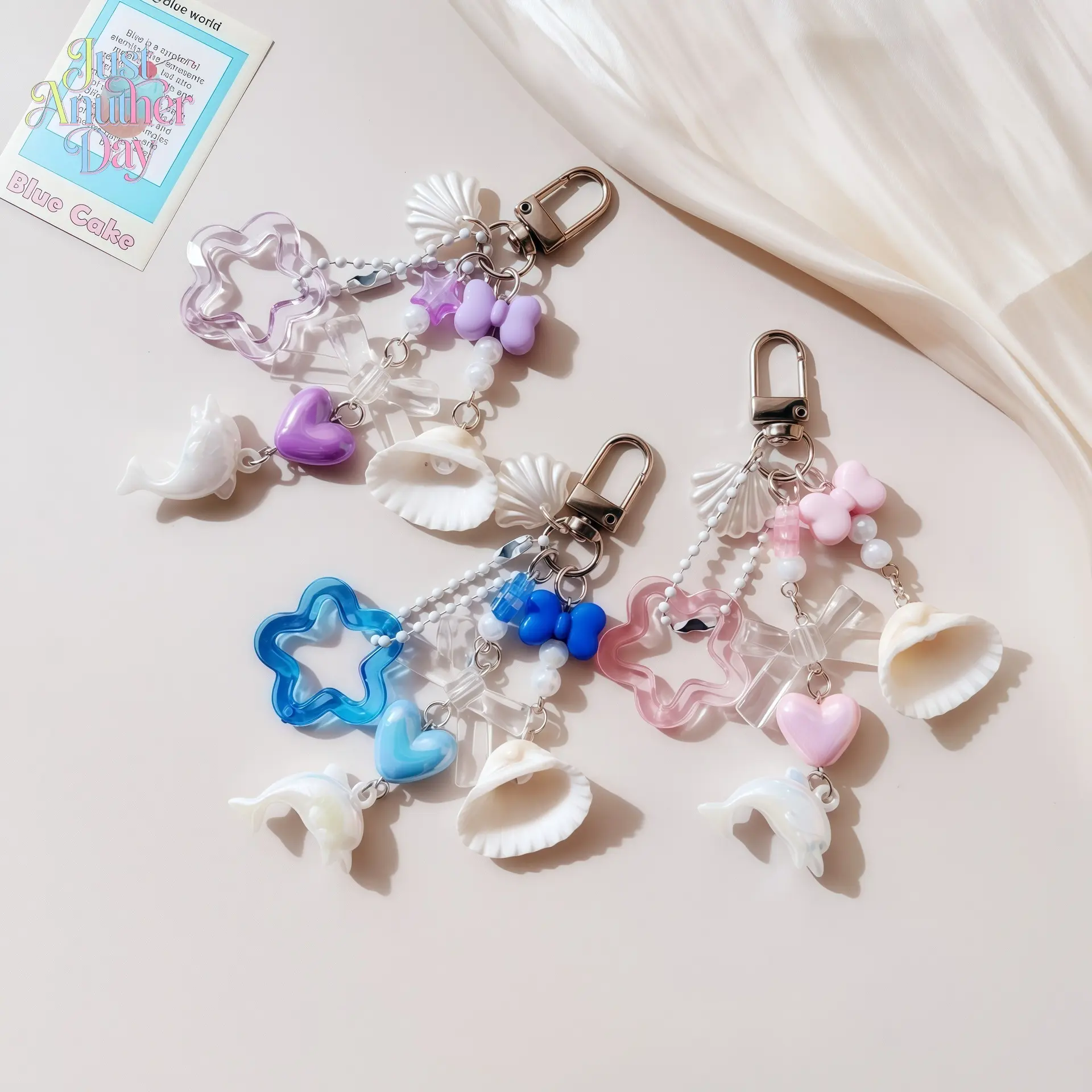 3-Pack Ocean Themed Keychain Charms, Dolphin & Shell Beaded Phone Straps, Kawaii Marine Style Bag Accessories with Star & Heart Details
