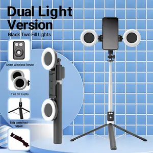 New model extended and retractable selfie stick tripod with dual fill lights, equipped with a wireless remote control, mobile phone live streaming stand, 360° rotating base, and portable design.