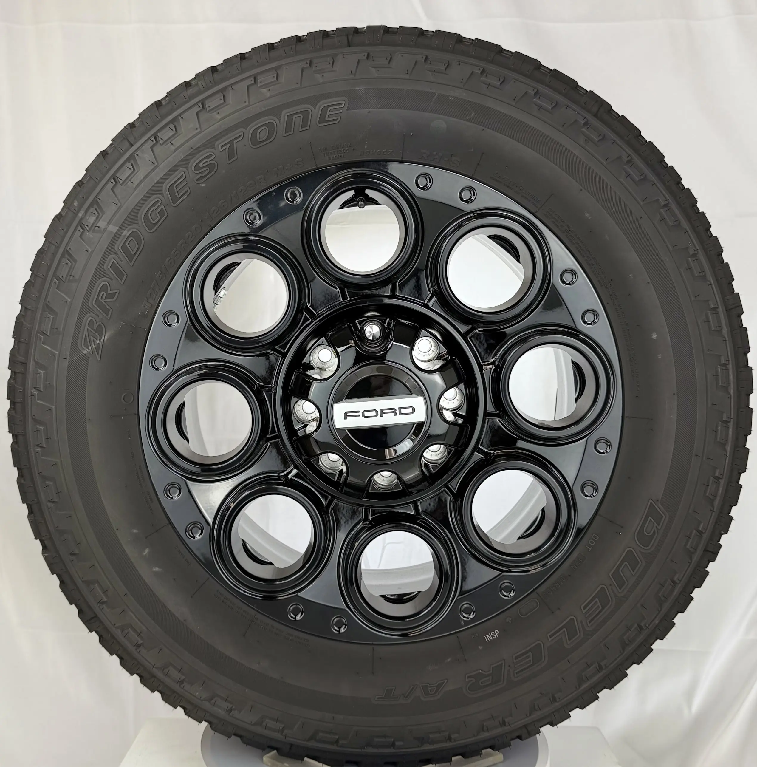 Set Of Four New Takeoff Ford F250 F350 Gloss Black 20" OEM Wheels with Bridgestone 275/65R20 All Terrain Tires