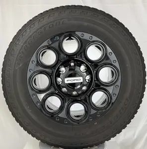 Set Of Four New Takeoff Ford F250 F350 Gloss Black 20" OEM Wheels with Bridgestone 275/65R20 All Terrain Tires
