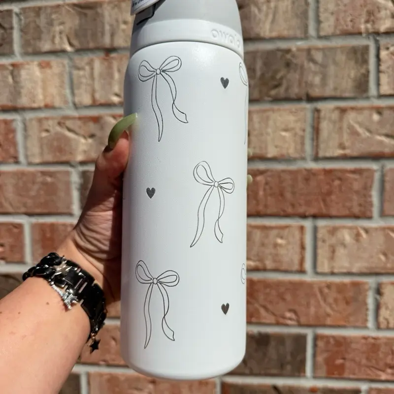 Owala Classic Stylish Beverage Portable Bottled Washable Cup 32oz with Engraved Design, Matte White Surface, and Flip-Top Lid