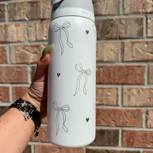 Owala Classic Stylish Beverage Portable Bottled Washable Cup 32oz with Engraved Design, Matte White Surface, and Flip-Top Lid