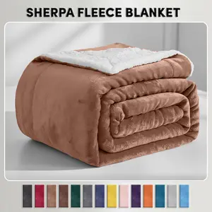 Soft Sherpa Fleece Blanket –  Dual-Layer Design featuring 230 GSM fleece and 180 GSM Sherpa for the perfect balance of lightweight relief and warmth. Ideal for relaxing nights or layering on your bed. Available in Twin, Queen, King, and Throw sizes.