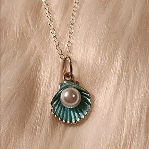 Teal Green Seashell Pendant Necklace Delicate Silver Chain 18 Inch Elegant Ocean Inspired Jewelry for Any Occasion