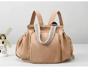 Water-Resistant Light Brown Large Capacity Multi-Pocket Backpack - Lightweight: Fits Short Outdoor Getaways & Daily Commutes (1-Bag Solution)