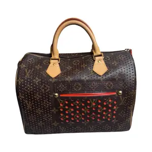 Pre-owned Louis Vuitton canvas Travel Bags Monogram Perforated Speedy 30 Orange