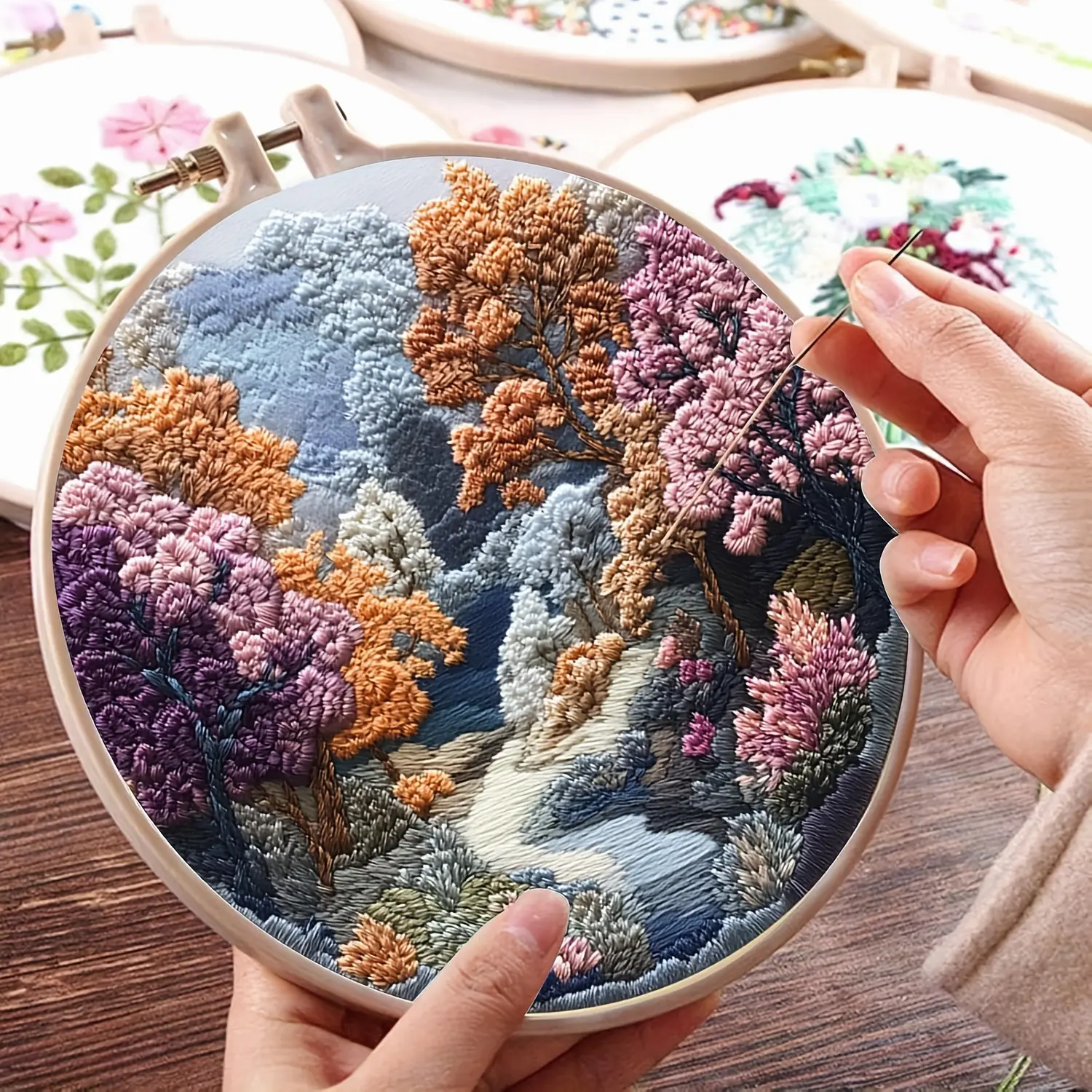 Beginner'S Embroidery Kit Designed for Adults Featuring a Landscape Pattern with Trees, Mountains, Rivers, And Floral Elements. This Hand Embroidery Set Includes Everything Needed for Cross-Stitching, Such As a Stamped Flower Design, Hoop
