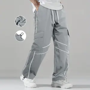 Men's regular-fit cargo pants featuring functional side zip pockets and an adjustable drawstring waistband, perfect for everyday comfort and versatile street-style outfits.