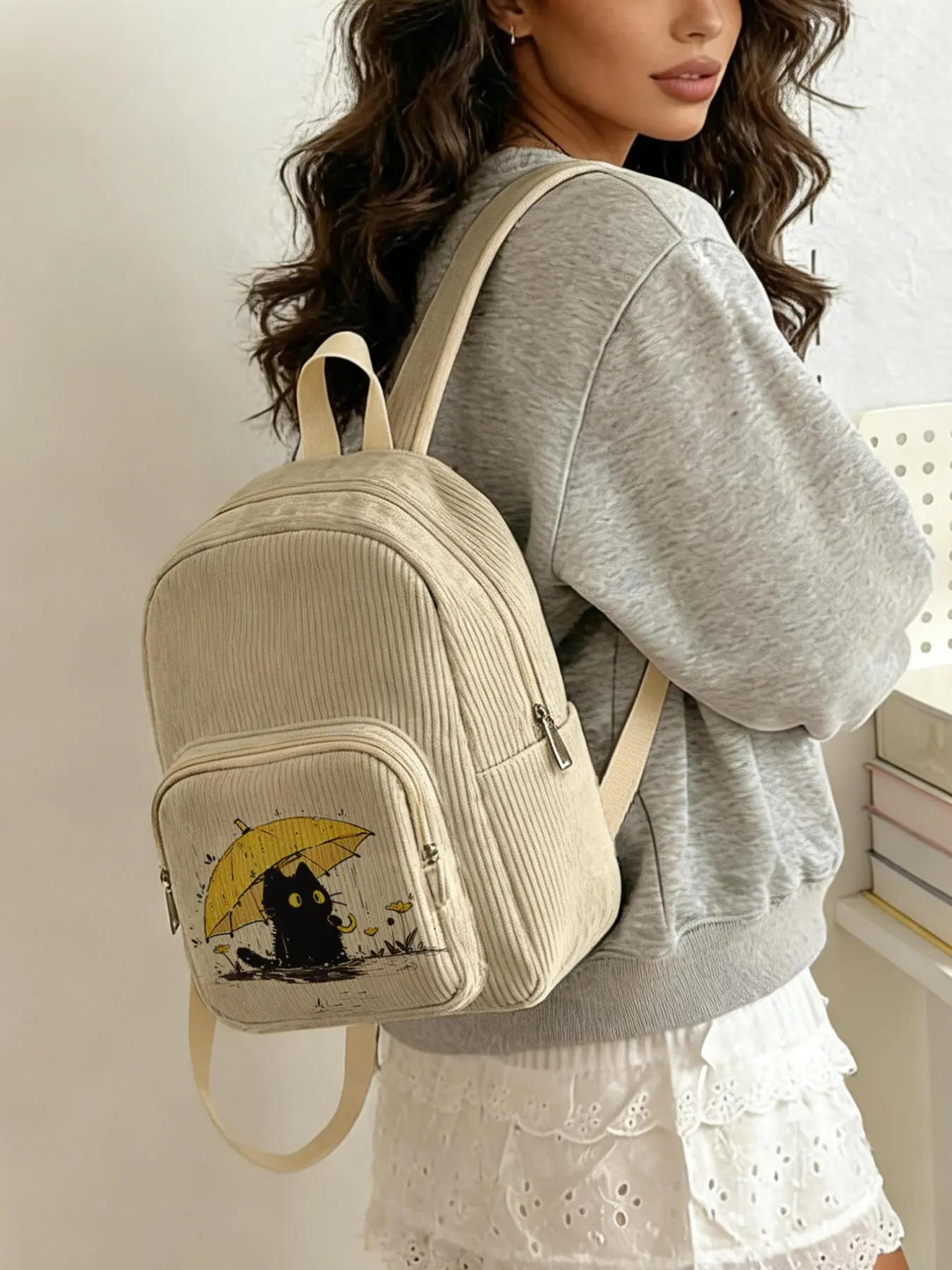 2D printed, Casual printed lady's backpack with black cat holding an umbrella pattern, velvet texture, layered storage, lightweight and easy to carry, perfect for students to go to class/shopping/short trips