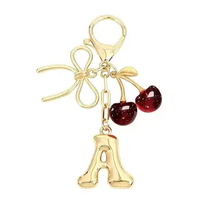 Golden Cherry Bow Keychain with Lobster Clasp - Red Cherry & Bow Letter Pendant Suitable for Backpacks, Handbags, Bag Charms, Car Keys, Initial for Name - Cute Daily Accessory Anniversary Decoration, Gifts for Birthday, Valentine's Day, Mother's Day