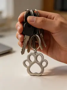Elegant Hollow Cat Paw Keychain, Minimalist Style, Durable Stainless Steel, Perfect for Pets Lovers, Car Keys, Backpacks, Versatile Accessory