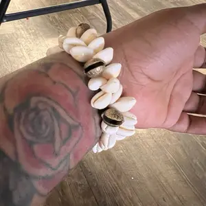 Cowrie shell & Tibetan bell bracelet