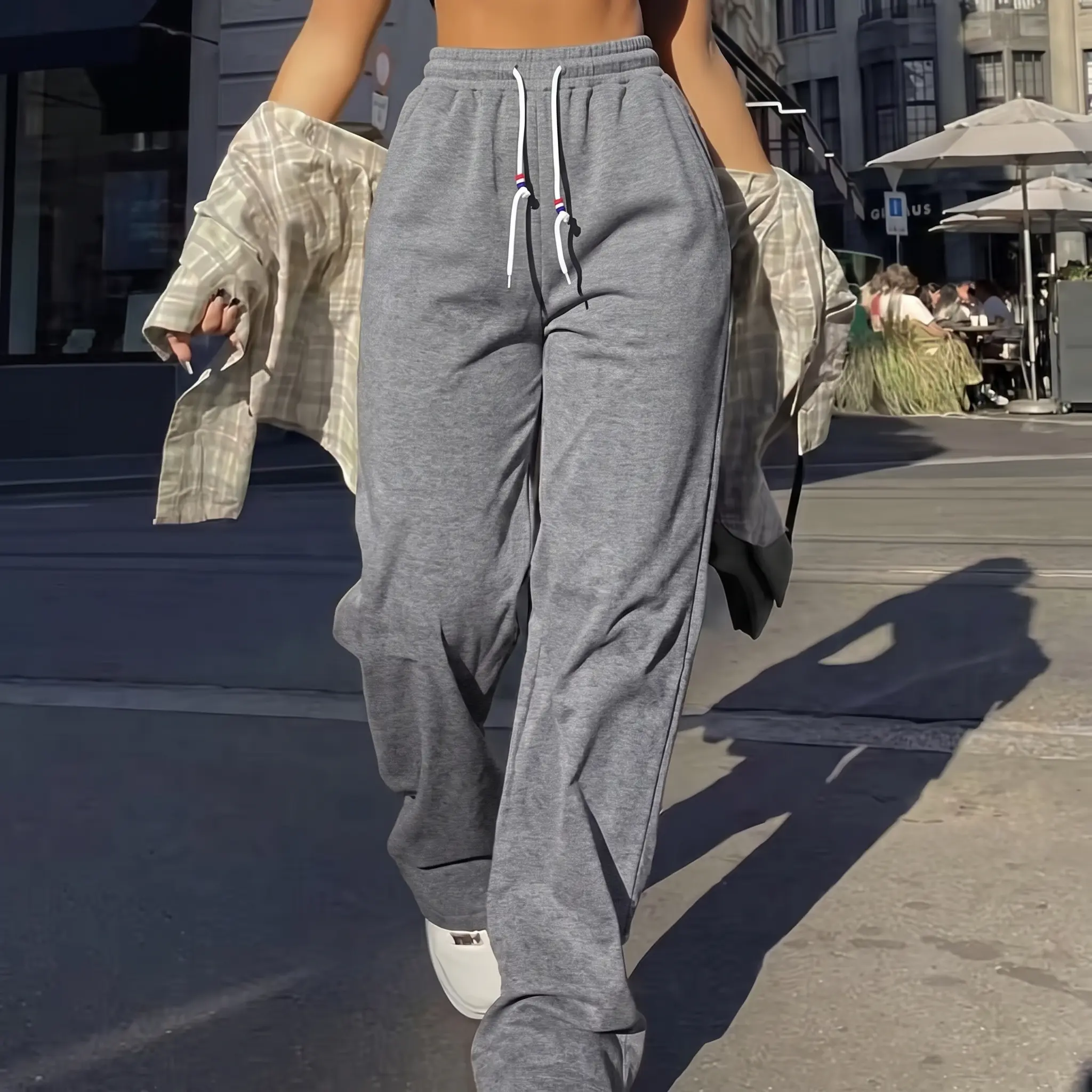 Life keeps moving — one women’s comfortable loose drawstring sweatpants; women’s casual wide-leg pants with elastic waistband; loose slightly stretchy fabric, machine washable; casual wear for autumn/winter.