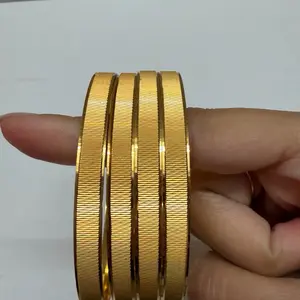 Gold Toned Bangles 4 Piece Set Traditional Look with Modern Touch Elegant Design Versatile Appeal Perfect Fit for Any Occasion Gold Plated Sophisticated Addition