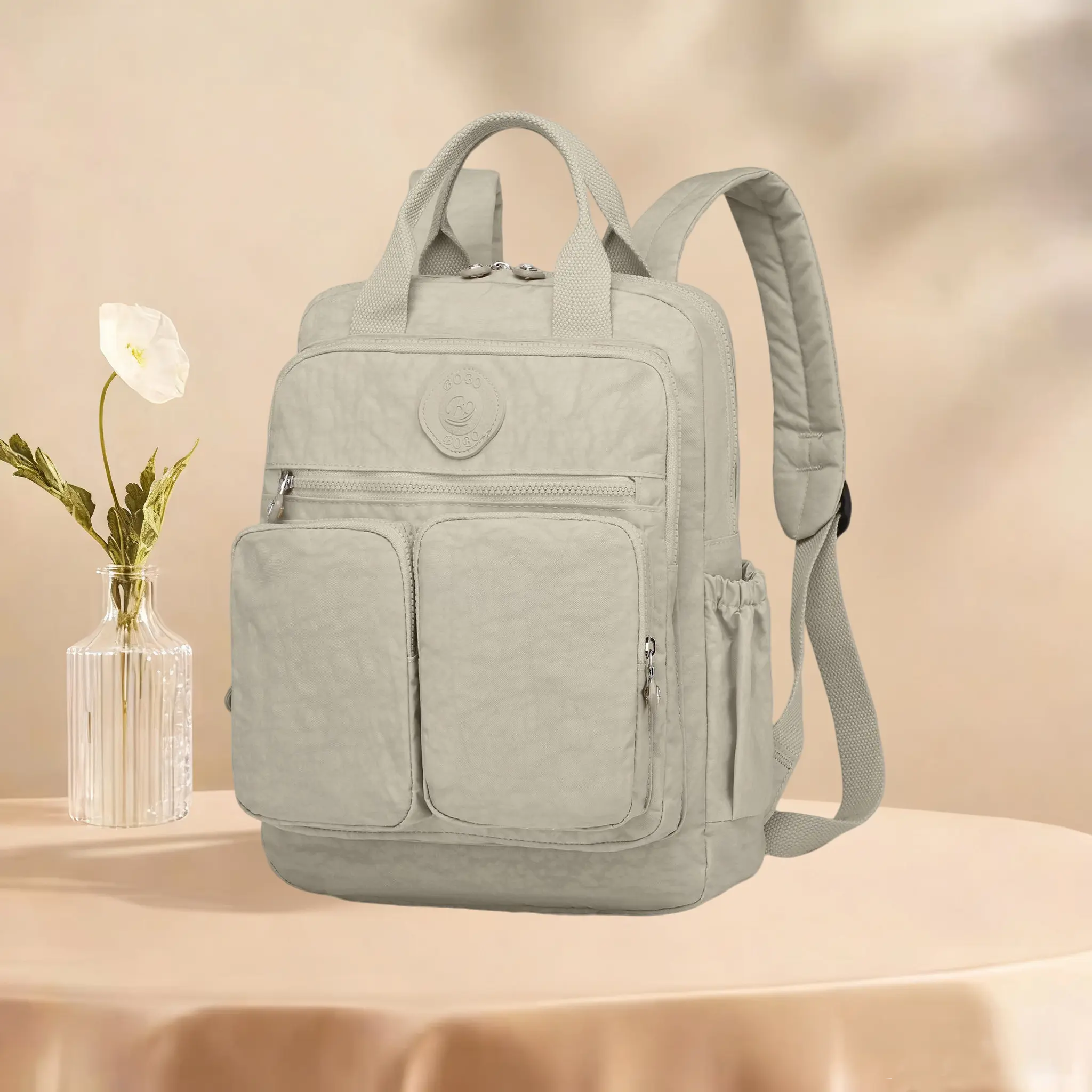 Multi-functional backpack – spacious, waterproof, and engineered for quick access. Ideal for commuting and traveling, it’s durable, lightweight, stylish, and features a top handle for hand-carrying.