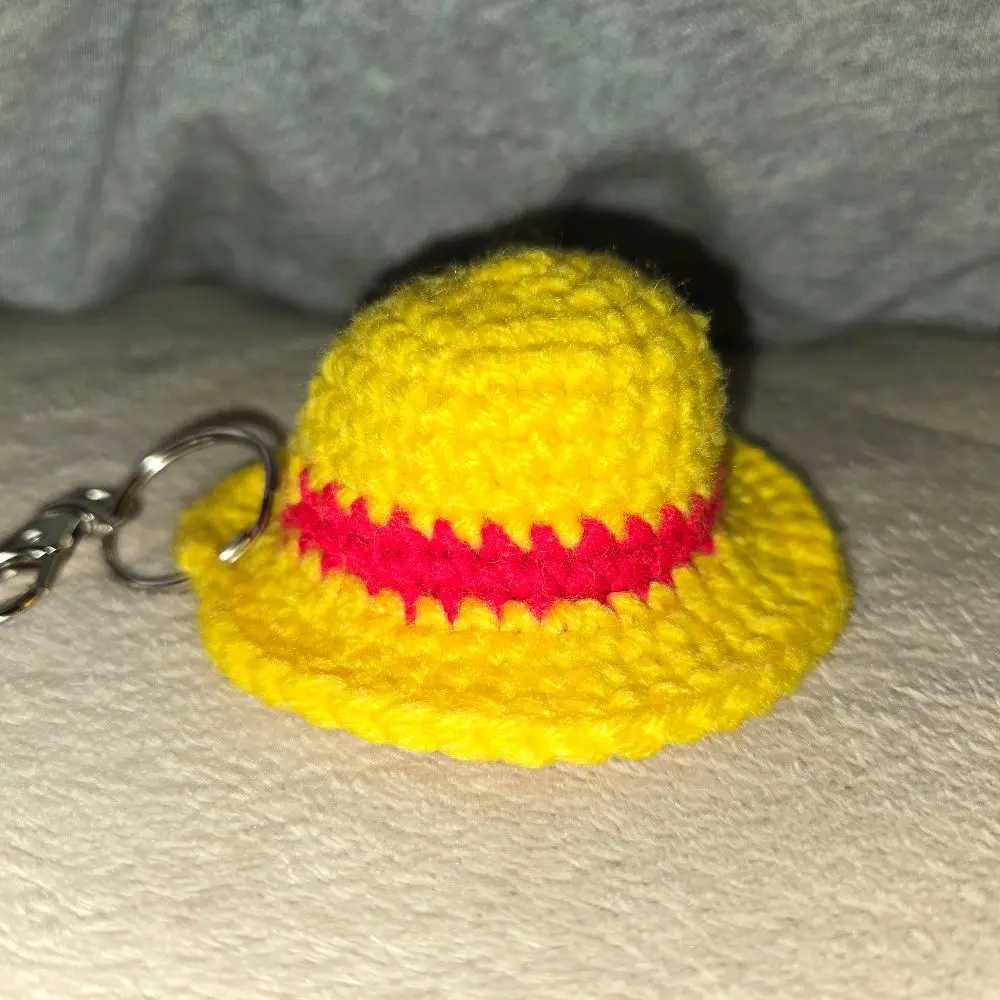 Luffy's Hat Keychain - Yellow Knit Hat with Red Strap, Adjustable Length, and Metal Clasp