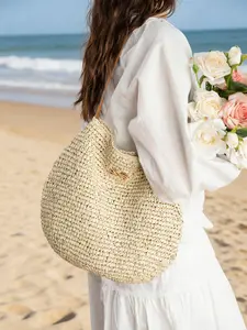 Minimalist and sophisticated handmade straw tote bag, made of natural raffia with large capacity, suitable for spring and summer vacations and daily wear, a versatile single-shoulder women's bag