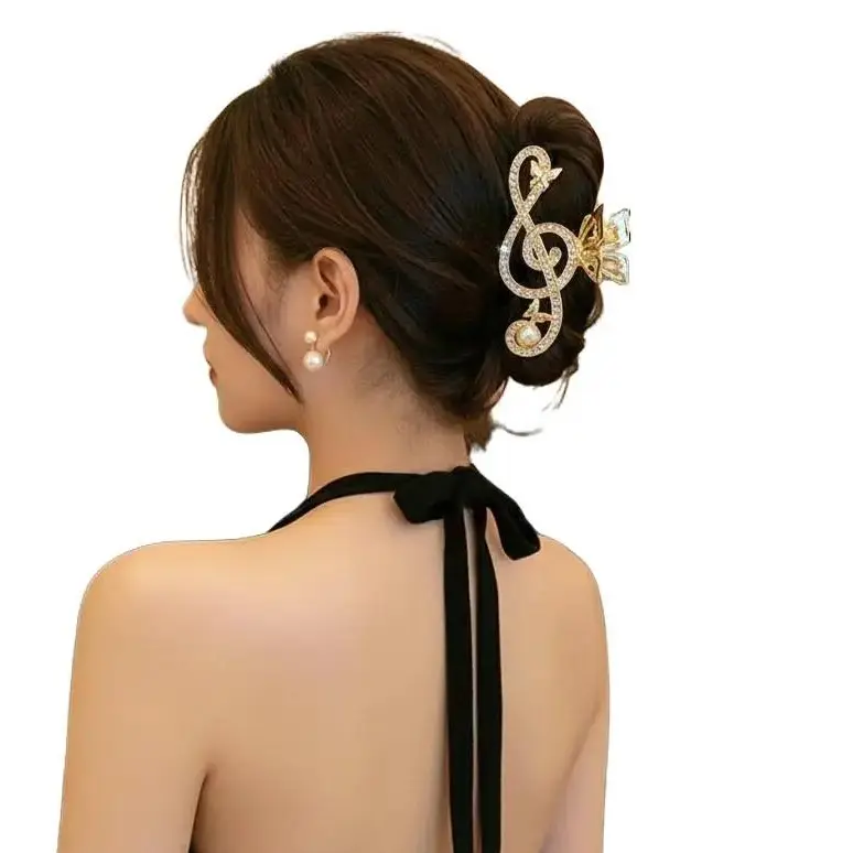 Treble Clef Hair Clip Gold Color Sparkling Rhinestone Barrette with Butterfly Accents for Music Lovers Formal Events and All Day Glam Musical Charm Hairpins