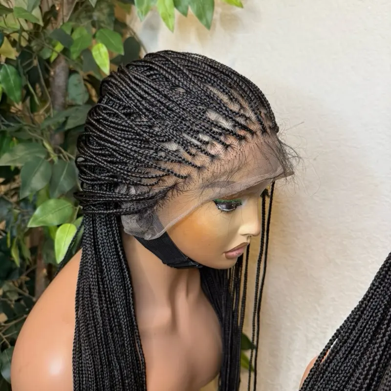 Micro knotless synthetic braids made with 360 full premium synthetic lace. for all occasions. Medium: Cap size :21.5 – 22.5”