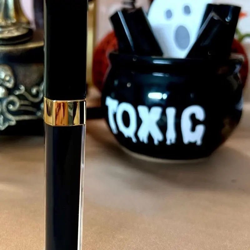 TOXIC Black Lip Gloss_Halloween_Goth Vibes