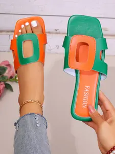Orange-green contrast square head flat bottom dopamine wind French wind hollow square buckle design ladies sandals vitality orange-green collision dopamine bright square buckle hollow exquisite French romance suitable for holiday dating street shooting.