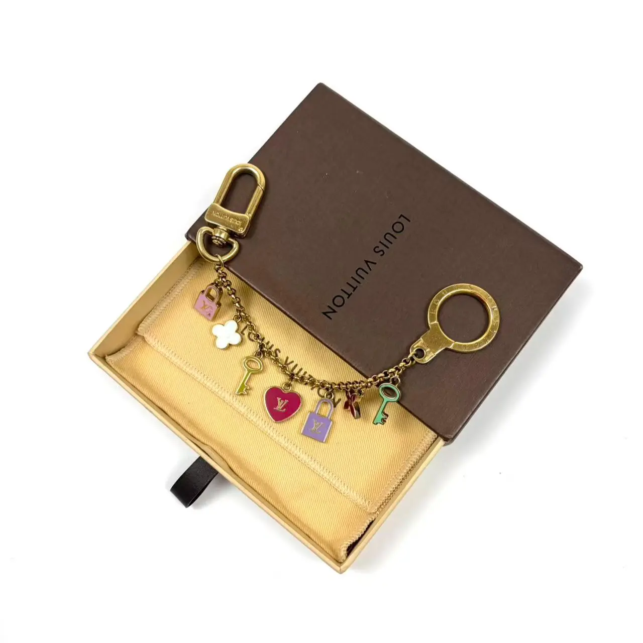 Pre-owned Louis Vuitton metals Bag Accessories Bag Charm, Pre Loved Luxury Bag Accessory for Luggage & Handbags