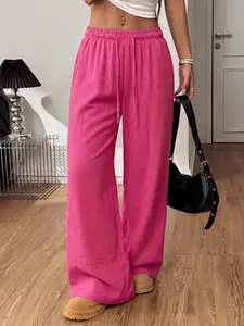 Women’s summer solid-color wide-leg pants—lightweight for the season with an elastic drawstring design; loose, drapey casual long pants that are versatile and stylish.