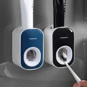 Automatic toothpaste squeezer Wall-mounted household automatic squeezer No punching toilet toothpaste toothbrush rack toothbrush sanitizer toothbrush sterilizer