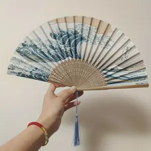 This portable folding bamboo fan, inspired by Japanese retro design, is a perfect choice for women. Featuring the iconic Kanagawa Wave pattern, it serves as an elegant decorative piece, Decoration.
