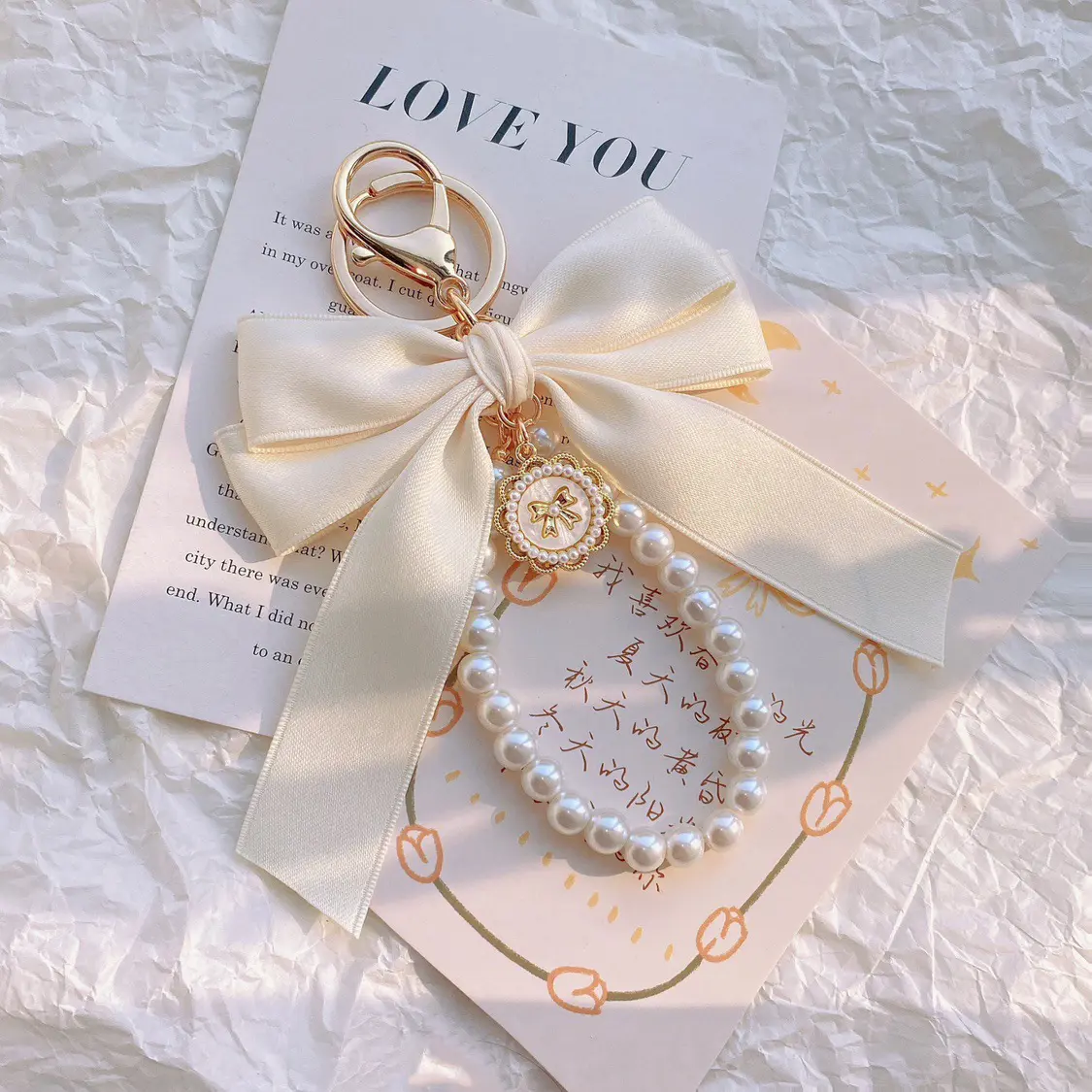 Women's Boutique Style Beaded Bag Keychain - Elegant Pearl Chain, Large White Bow Charm, Cute Chain-Attached Keychain Accessories for Purse, Backpack, Car Keys, Gift Option, Cute Keychains