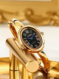 Women's Luxury Vintage Oval Bangle Watch Polished Gold Tone Case, Roman Numeral Black Dial, Delicate Blue Hands, Integrated Bangle Bracelet, Ideal for Daily Commute & Elegant Gifting, Vintage Quartz Watch