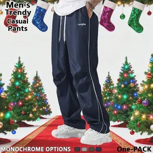 Loose-fitting men's sweatpants with grey side stripes and gold accent stripes. Comfortable design, sports casual style bottoms, sweatpants, fitness wear for all seasons.