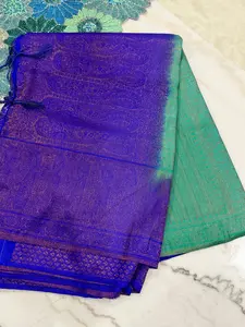 Regal Bloom Maroon & Gold Silk Saree with Green Accents